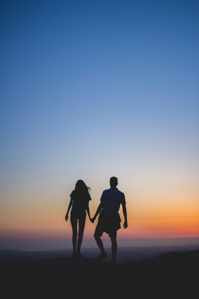 Silhouette of a happily married couple enjoying life with the peace of mind of a prenuptial agreement