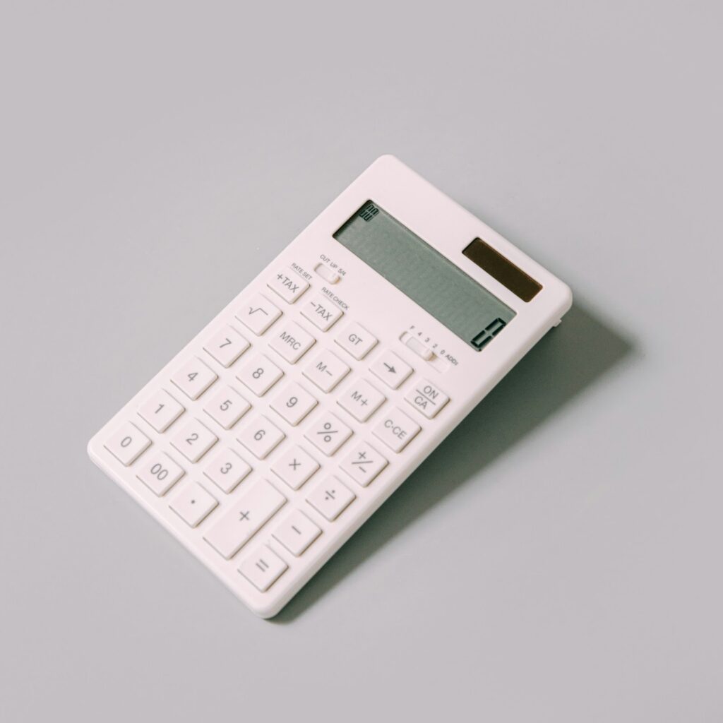 White calculator to represent the cost of affordable prenuptial agreement services